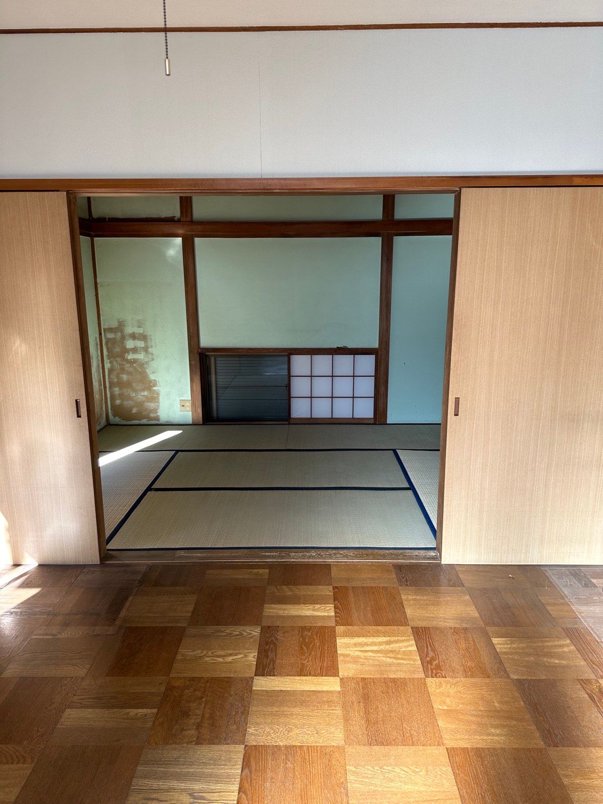 Original living area with sliding doors before akiya restoration